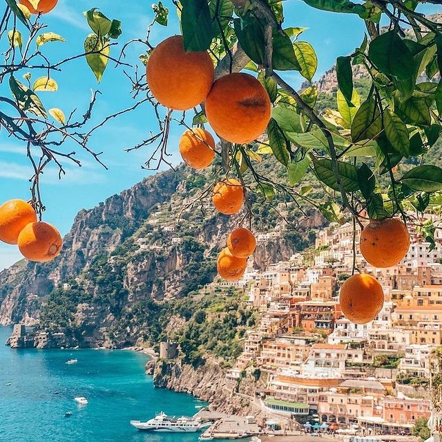 Nestled in the rock and framed by orange and lemon trees, Positano overlooks the blue sea? @nickipositano#enjoythecoast #sorrentocoast #costieraamalfitana #amalficoast #igersitalia #italy_vacations #traveltheworld #italytrip #bestplacesmagazine #destinationearth #earthpix